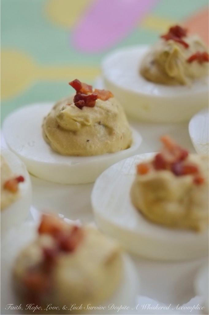 Balsamic Deviled Eggs with Pancetta - Are you looking for a new deviled egg to brighten up your holiday table or make your picnic or barbeque a little more exciting? Then these balsamic vinegar deviled eggs topped with crispy diced pancetta are what you're looking for. They're a little salty, a little sweet, and a whole lot of irresistible.