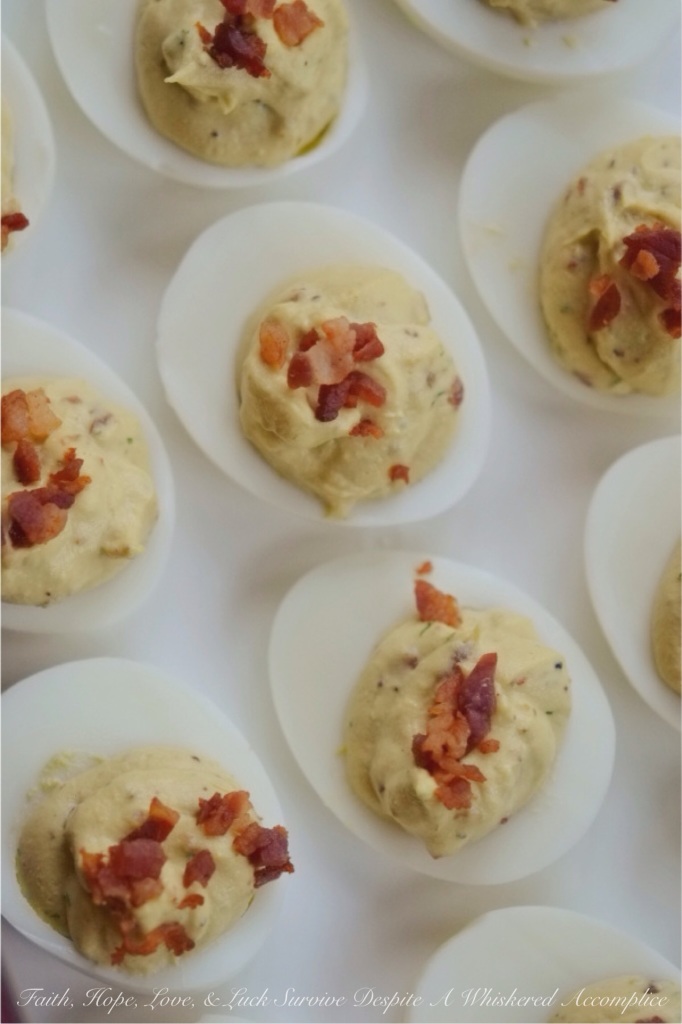 Balsamic Deviled Eggs with Pancetta - Are you looking for a new deviled egg to brighten up your holiday table or make your picnic or barbeque a little more exciting? Then these balsamic vinegar deviled eggs topped with crispy diced pancetta are what you're looking for. They're a little salty, a little sweet, and a whole lot of irresistible.