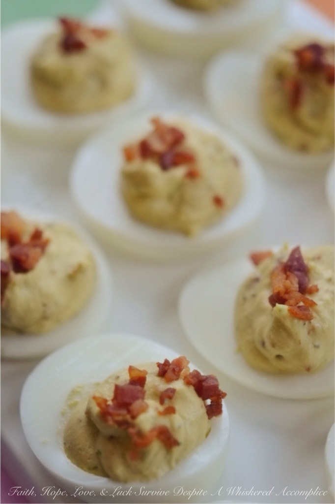 Balsamic Deviled Eggs with Pancetta - Are you looking for a new deviled egg to brighten up your holiday table or make your picnic or barbeque a little more exciting? Then these balsamic vinegar deviled eggs topped with crispy diced pancetta are what you're looking for. They're a little salty, a little sweet, and a whole lot of irresistible.