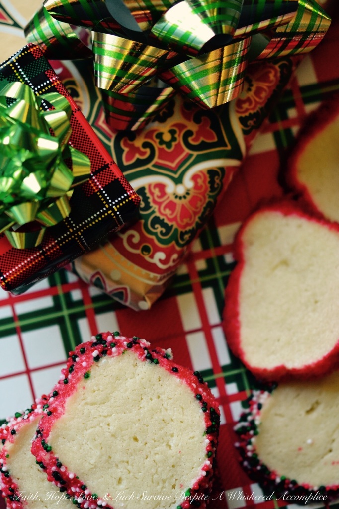 Polish Christmas Cookies - Krakiowanki, also known as Polish Christmas Cookies, are butter and cream cheese slice-and-bake cookies, coated in sprinkles or colored sugar. With their colorful and festive presentation, these simple and delicious cookies make a great addition to any holiday cookie plate or tray.