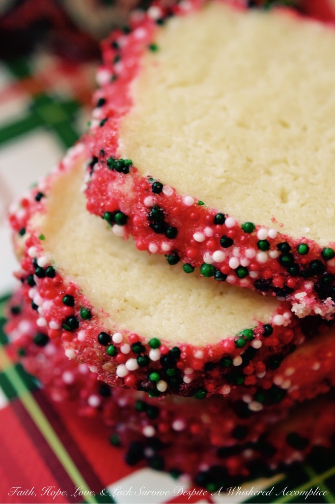 Polish Christmas Cookies - Krakiowanki, also known as Polish Christmas Cookies, are butter and cream cheese slice-and-bake cookies, coated in sprinkles or colored sugar. With their colorful and festive presentation, these simple and delicious cookies make a great addition to any holiday cookie plate or tray.