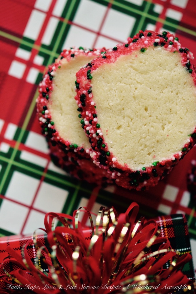 Polish Christmas Cookies - Krakiowanki, also known as Polish Christmas Cookies, are butter and cream cheese slice-and-bake cookies, coated in sprinkles or colored sugar. With their colorful and festive presentation, these simple and delicious cookies make a great addition to any holiday cookie plate or tray.