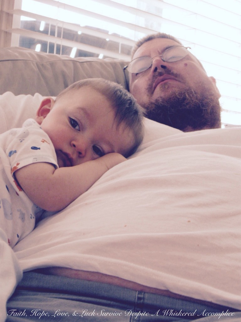 Sleeping on Uncle Matt's Tummy | Faith, Hope, Love, and Luck Survive Despite a Whiskered Accomplice