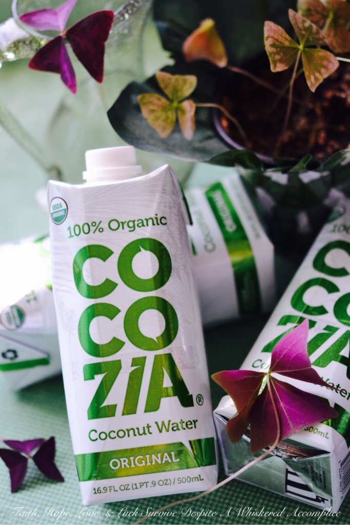 Cocozia Organic Coconut Water | Faith, Hope, Love, and Luck Survive Despite a Whiskered Accomplice
