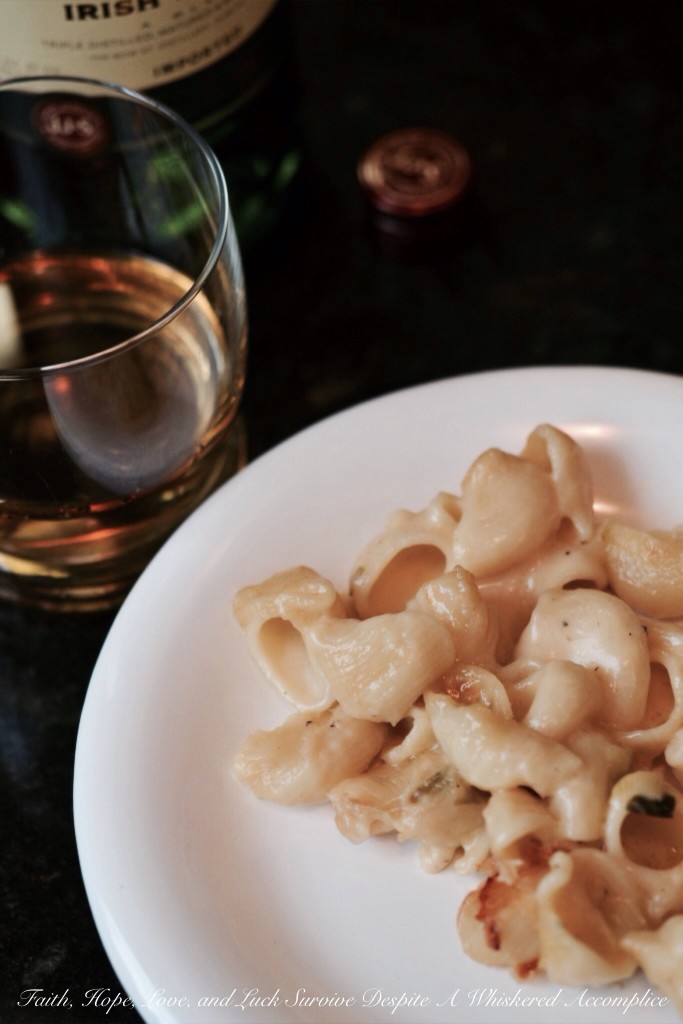 Irish Whiskey Scallion Mac and Cheese - This rich and creamy mac and cheese gets a St. Patrick's Day makeover with the addition of Irish whiskey. Irish butter, scallions, and Irish cheese also help to give this decadent pasta dish a special holiday flavor.