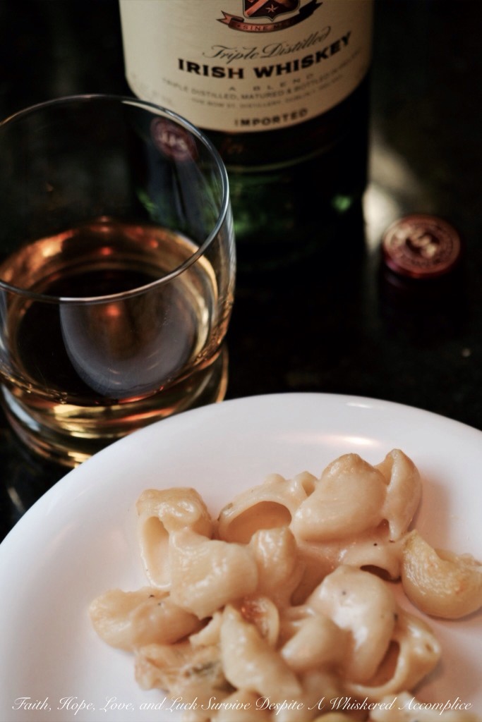 Irish Whiskey Scallion Mac and Cheese - This rich and creamy mac and cheese gets a St. Patrick's Day makeover with the addition of Irish whiskey. Irish butter, scallions, and Irish cheese also help to give this decadent pasta dish a special holiday flavor.