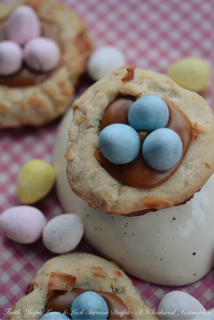 Pretzel Birds Nest Cookies - These charming little spring cookies get their nest-like appearance thanks to crushed pretzels and flaked coconut. After being filled with melted caramel and then topped with a few chocolate candy eggs, these sweet, heavenly thumbprint cookies are ready for some serious Easter munching.