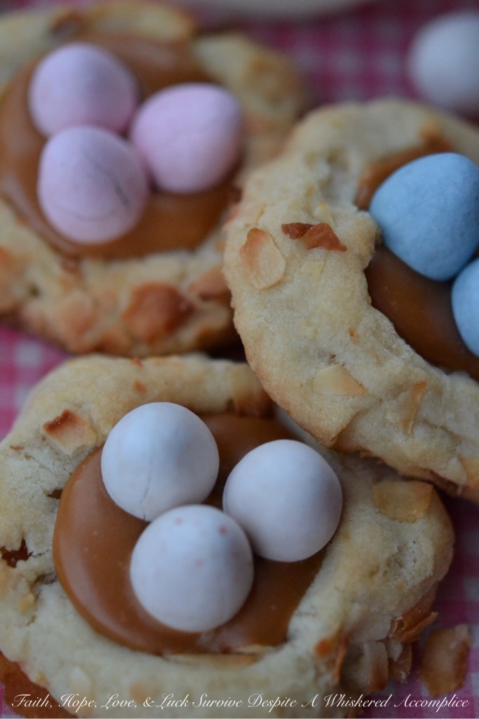 Pretzel Birds Nest Cookies - These charming little spring cookies get their nest-like appearance thanks to crushed pretzels and flaked coconut. After being filled with melted caramel and then topped with a few chocolate candy eggs, these sweet, heavenly thumbprint cookies are ready for some serious Easter munching.