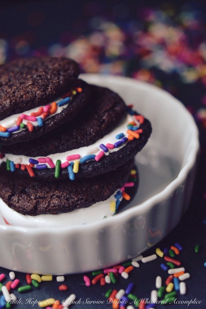 Rainbow S'moreo Cookies - Homemade from-scratch Oreo cookies are pretty great on their own, but they're even better when you add graham cracker crumbs to the cookie dough, stuff them with marshmallow creme, and then roll them in sprinkles. You can change the color of the sprinkles depending on the holiday or occasion.