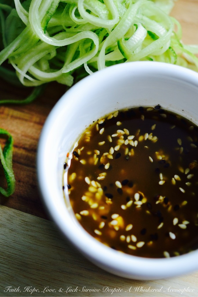Quick No-Cook Asian Zucchini Noodles - When summer arrives, bringing with it an over-abundance of zucchini, it's time to break out the spiralizer or slicer to make homemade zoodles. Topped with a simple Asian dressing, this no-cook vegetable side dish will easily become a favorite recipe you'll turn to over and over again all summer long.