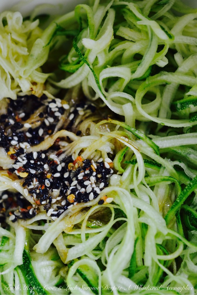 Quick No-Cook Asian Zucchini Noodles - When summer arrives, bringing with it an over-abundance of zucchini, it's time to break out the spiralizer or slicer to make homemade zoodles. Topped with a simple Asian dressing, this no-cook vegetable side dish will easily become a favorite recipe you'll turn to over and over again all summer long.