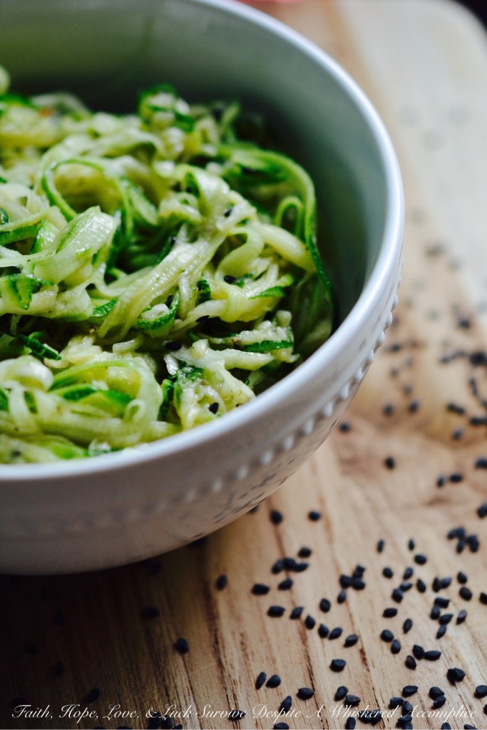 Quick No-Cook Asian Zucchini Noodles - When summer arrives, bringing with it an over-abundance of zucchini, it's time to break out the spiralizer or slicer to make homemade zoodles. Topped with a simple Asian dressing, this no-cook vegetable side dish will easily become a favorite recipe you'll turn to over and over again all summer long.