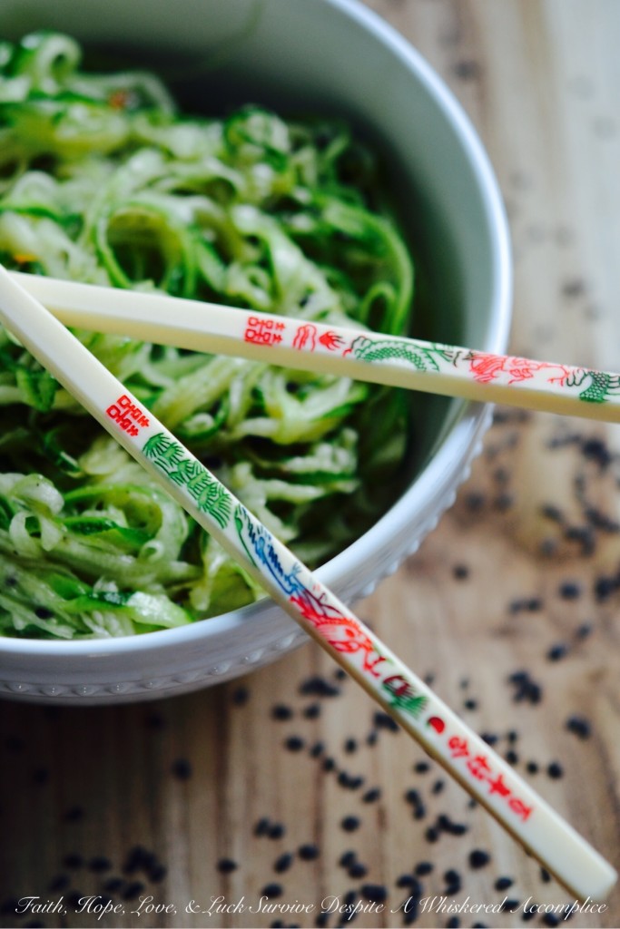 Quick No-Cook Asian Zucchini Noodles - When summer arrives, bringing with it an over-abundance of zucchini, it's time to break out the spiralizer or slicer to make homemade zoodles. Topped with a simple Asian dressing, this no-cook vegetable side dish will easily become a favorite recipe you'll turn to over and over again all summer long.