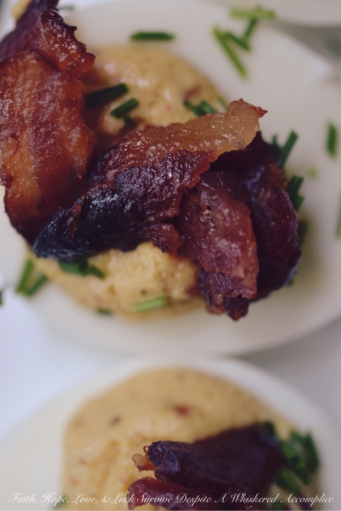 Bourbon Candied Bacon Deviled Eggs - At our house, it doesn’t get any better than deviled eggs with bacon. Bourbon candied bacon, that is. If you can resist these bacon-loaded deviled eggs, then there is most definitely a huge problem because we certainly can't. These are clearly an appetizer that will disappear in the blink of an eye, so to be safe, we suggest doubling the recipe.