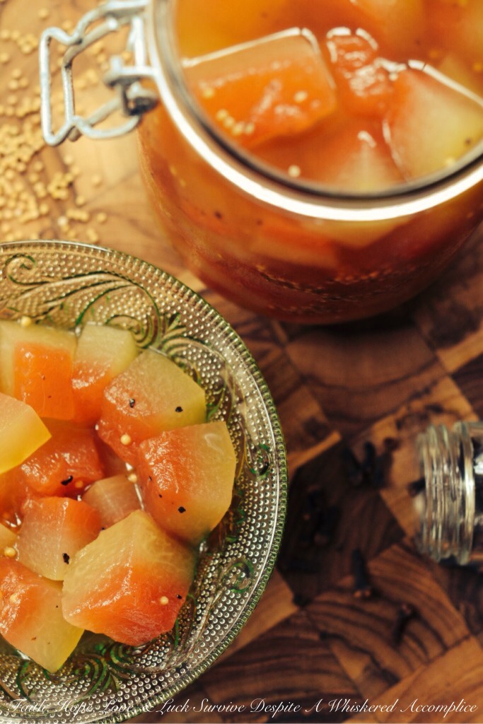 Sweet and Tangy Watermelon Rind Pickles - If you're someone who hates to throw away anything that can still be put to good use, this recipe is for you. The next time you find yourself cutting up a watermelon, make sure to save the rind because the watermelon rind can be used to make these sweet and tangy pickles. They're an extremely flavorful addition to almost any summer meal.