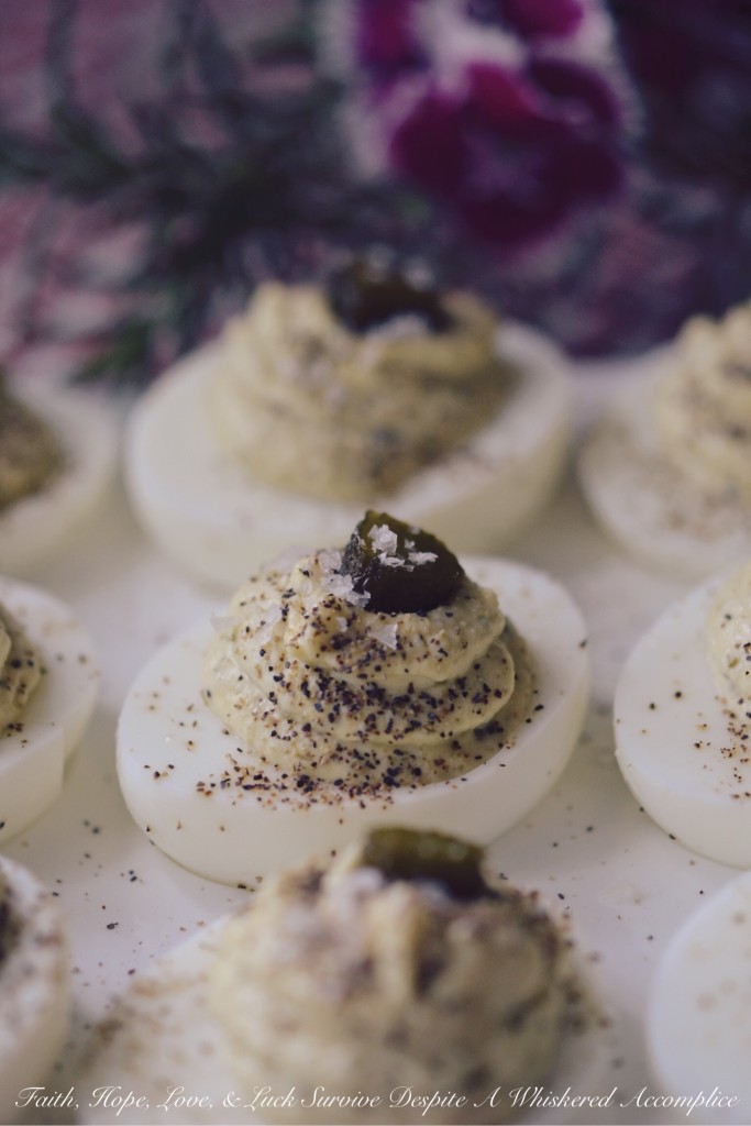 Salt and Pepper Sweet Pickle Deviled Eggs - Deviled eggs are probably one of the appetizers people get most excited about when they appear on a holiday table or at a special event. Thankfully, it doesn't take much to turn an ordinary deviled egg into an extraordinary one. In this case, all that's needed is a little bit of flakey sea salt, finely ground black pepper, and a few added slices of sweet pickle.