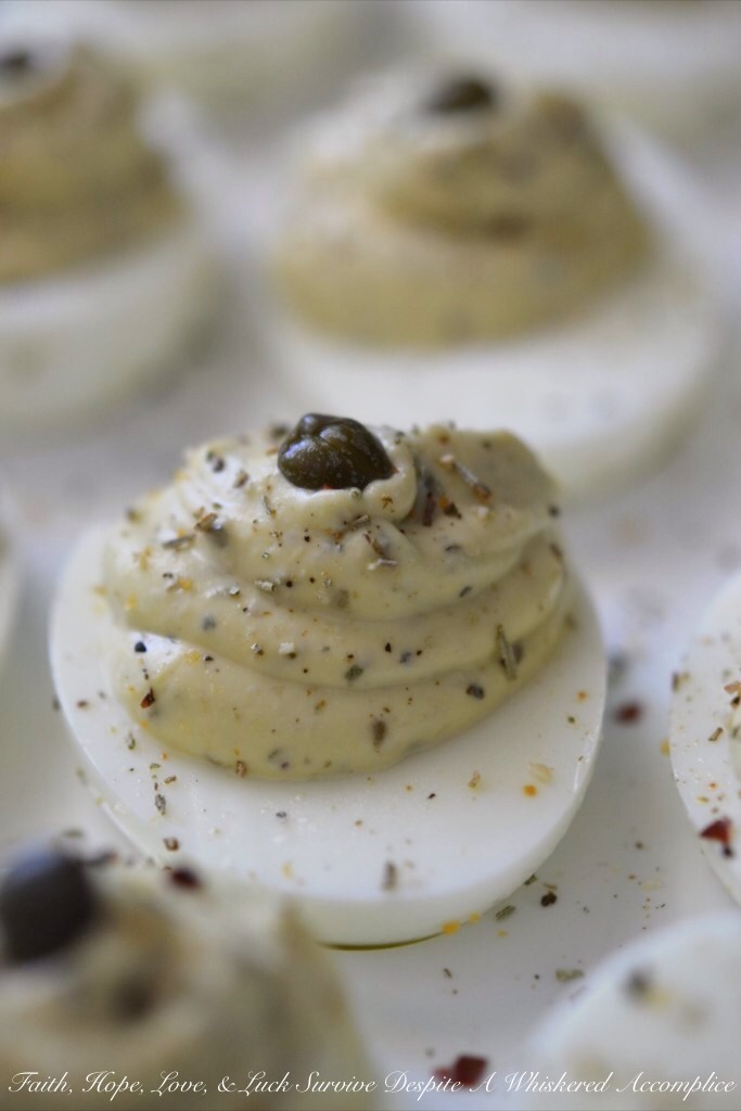 Italian Caper Deviled Eggs - While the classic combination of mayonnaise and mustard is undeniably delicious, when it comes to deviled eggs, sometimes you crave something a little different. Instead of using traditional mustard, we're adding crushed red pepper flakes, Italian seasoning, and capers to add a burst of flavor and a refreshing twist to these mouth-watering deviled eggs. Get ready for an appetizer that's refreshing, zesty, and sure to be a conversation starter at your next gathering.