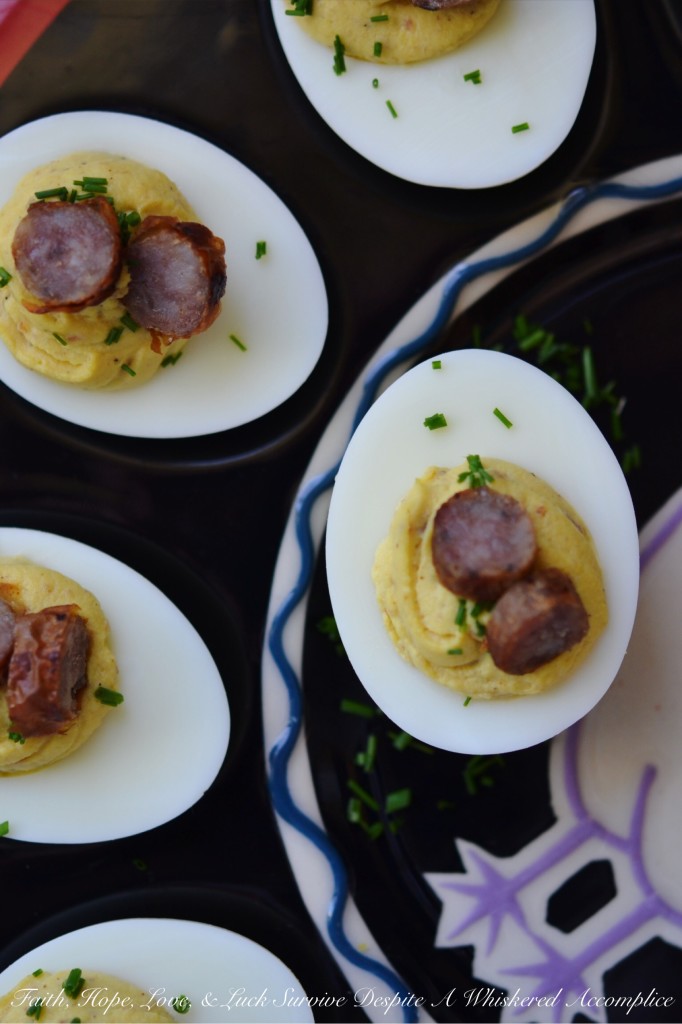 Maple Sausage Breakfast Deviled Eggs - Imagine the creamy, tangy goodness of a classic deviled egg infused with the irresistible taste of maple sausage. Perfectly seasoned with mayonnaise, mustard, black pepper, and a touch of real maple syrup, these utterly delicious deviled eggs are garnished with a festive and flavorful sprinkle of fresh chives as well as a few slices of maple sausage. Whether you're looking for a unique appetizer or a fun addition to your next brunch spread, these delightful breakfast-worthy deviled eggs are guaranteed to be a conversation starter.