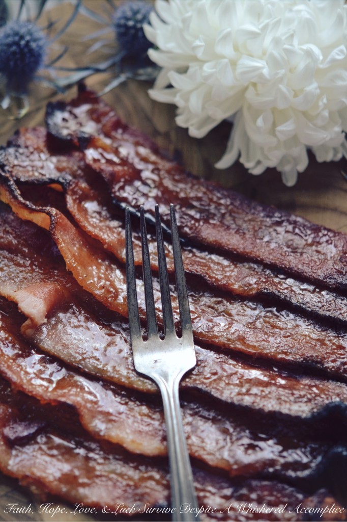 Basic Candied Bacon - Why have normal bacon, when you can have candied bacon? This basic candied bacon, uses brown sugar, maple syrup, Dijon mustard, and ground chipotle to transform ordinary oven-baked bacon into something truly unforgettable. You may never eat normal bacon again.