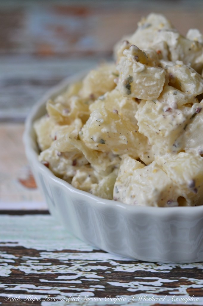 Tarragon Caramelized Onion Potato Salad - Looking for a new potato salad recipe that will delight your summer guests? This tarragon caramelized onion potato salad is definitely it. A few tablespoons of tarragon vinegar and caramelized onions help to give this summer side salad a unique and unforgettable flavor.
