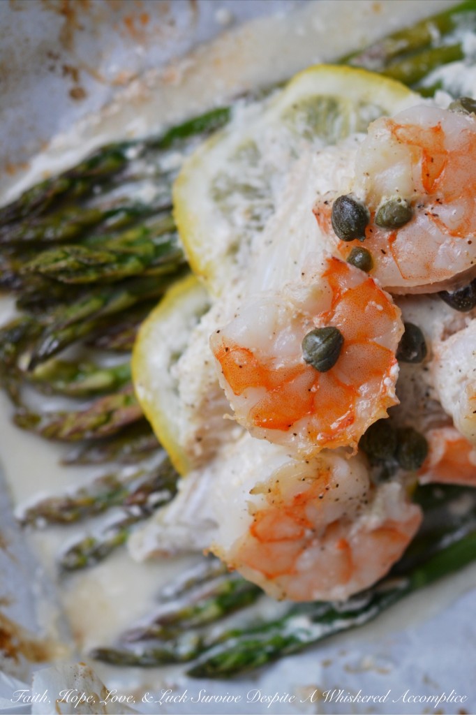 Lemony Mayonnaise Cod, Shrimp, and Asparagus Parchment Paper Wrapped Bundles - Get ready to enjoy a flavorful, flaky, and incredibly convenient meal that will become a new favorite in your dinnertime rotation. Flaky cod and succulent shrimp are baked to tender perfection along with crisp fresh asparagus and thin slices of zesty lemon in parchment paper-wrapped bundles. With their bright and creamy lemony mayonnaise sauce, these delightful fish and seafood bundles are perfect for a quick weeknight meal or a sophisticated weekend dinner.