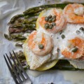 Lemony Mayonnaise Cod, Shrimp, and Asparagus Parchment Paper Wrapped Bundles - Get ready to enjoy a flavorful, flaky, and incredibly convenient meal that will become a new favorite in your dinnertime rotation. Flaky cod and succulent shrimp are baked to tender perfection along with crisp fresh asparagus and thin slices of zesty lemon in parchment paper-wrapped bundles. With their bright and creamy lemony mayonnaise sauce, these delightful fish and seafood bundles are perfect for a quick weeknight meal or a sophisticated weekend dinner.