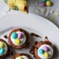 Make Easter "egg"stra special this year with these decadent brownie nests, which are packed full of flavorful coconut and then topped with a swirl of royal icing and decorated with a few candy chocolate eggs. They're a sweet chocolatey way to say "Welcome Spring."