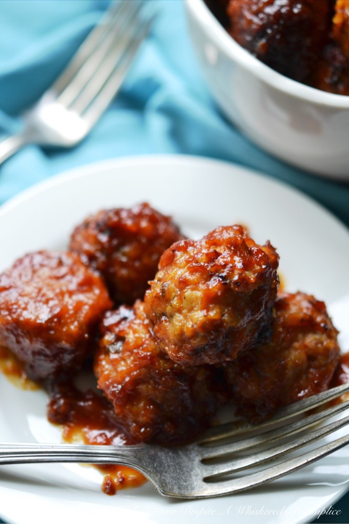 Make-Ahead Apricot Party Crockpot Meatballs - Hosting a party or large gathering can be stressful, but the food doesn't have to be. These ground chicken meatballs are a real game-changer for busy hosts. The secret to their success lies in their make-ahead and freeze-friendly nature. Assemble and bake the meatballs in advance, freeze them, and then let your crockpot do the rest on party day. Four hours before your party or gathering, toss the frozen meatballs into a crockpot on low heat with a tangy-sweet sauce made with chili sauce, apricot preserves, Dijon mustard, and a touch of garlic powder. These make-ahead apricot party meatballs are sure to be the life of the party.
