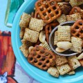 Crockpot Rice Chex Mix - When it's too hot to fire up your oven or you just need an excuse to dust off your seldom-used crockpot, this homemade rice chex mix is the perfect snack recipe. It's a simple, savory treat that's ideal for lazy days around the house. Just toss everything in a crockpot, stir occasionally, and within a few hours, you'll have a crunchy, flavorful, and addictive savory snack to munch on.