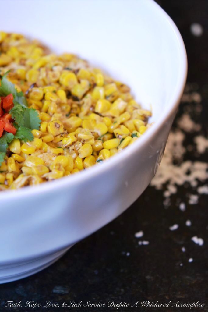 Mexican Street Corn Salad - Looking for a quick and easy Mexican side dish to celebrate Cinco de Mayo? Well then, this is the street corn salad recipe you've been waiting for. Not only is this Mexican Street Corn Salad packed with flavor but it's also a great way to turn frozen corn into a side salad fit for a fiesta.