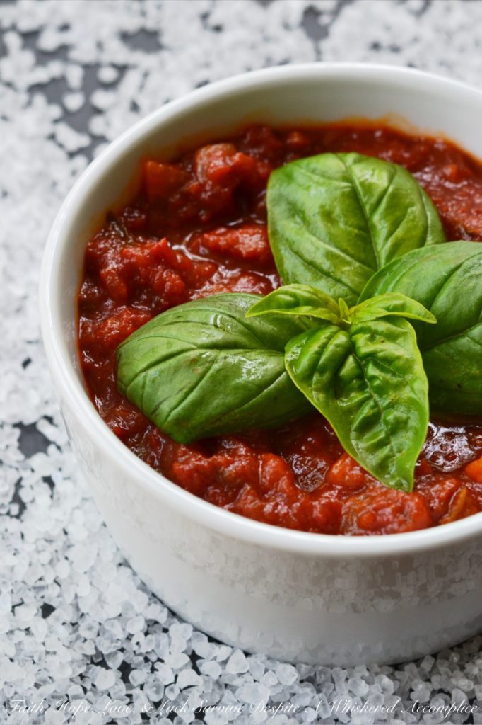 Toss It All In Chunky Crockpot Tomato Sauce - This homemade chunky tomato sauce, simmered in a crockpot, doesn't get any simpler or any more delicious. Unlike some recipes, which require sautéeing the onions and garlic first, this flavorful recipe skips past those steps, making it perfect to throw together on a weekday morning before heading off to work.