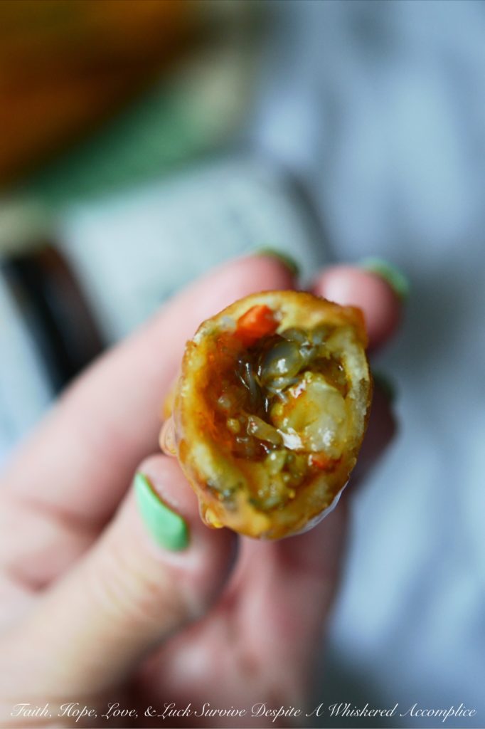 Cajun Shrimp Egg Rolls - Asian meets Cajun in this easy-to-make Cajun Shrimp Egg Roll recipe. Use store-bought spring roll shells, cellophane noodles, and cole slaw mix to make flavorful crunchy egg rolls, with the addition of chopped shrimp and Cajun seasoning. Serve with honey for the perfect sweet and spicy flavor combination.
