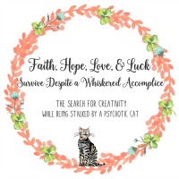 Faith, Hope, Love, & Luck Survive Despite a Whiskered Accomplice