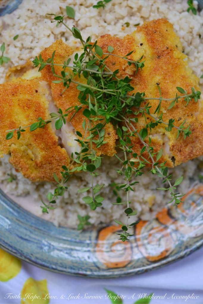 Cornmeal Crusted Cod with Buttermilk Cauliflower Rice - Imagine tender, flaky cod fillets that are pan-fried to a beautiful golden brown with a satisfyingly crispy cornmeal crust. Now picture those fish fillets served on a bed of creamy, tangy cauliflower rice seasoned with buttermilk. Get ready to add a little adventure to your weeknight dinner routine because this is definitely not your ordinary fish and vegetable combination.