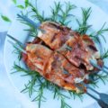 Gourmet Prosciutto Wrapped Fish Sticks with Redneck Pineapple Chutney - This recipe is a little bit gourmet and a little bit redneck. I'm not sure which one wins in the end, but it's safe to say that you're not gonna care. This grilled prosciutto-wrapped fish on a stick is super-tender and full of flavor thanks to the easy-to-make homemade chutney sauce it's brushed with. A few tablespoons of pineapple jam, jelly, or preserves, mixed with a bit of barbecue sauce, olive oil, and ground chipotle is all that is needed to create a simple, flavorful, and insanely tasty grilled fish meal that feels almost gourmet.