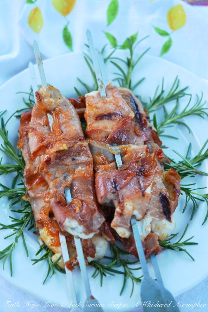 Gourmet Prosciutto Wrapped Fish Sticks with Redneck Pineapple Chutney - This recipe is a little bit gourmet and a little bit redneck. I'm not sure which one wins in the end, but it's safe to say that you're not gonna care. This grilled prosciutto-wrapped fish on a stick is super-tender and full of flavor thanks to the easy-to-make homemade chutney sauce it's brushed with. A few tablespoons of pineapple jam, jelly, or preserves, mixed with a bit of barbecue sauce, olive oil, and ground chipotle is all that is needed to create a simple, flavorful, and insanely tasty grilled fish meal that feels almost gourmet.