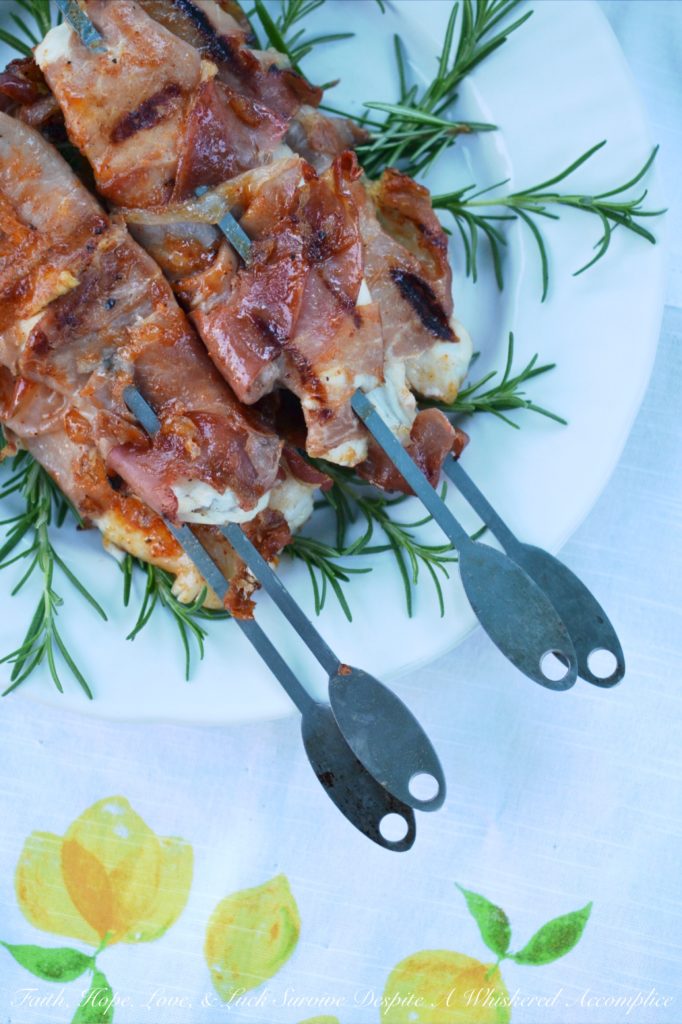 Gourmet Prosciutto Wrapped Fish Sticks with Redneck Pineapple Chutney - This recipe is a little bit gourmet and a little bit redneck. I'm not sure which one wins in the end, but it's safe to say that you're not gonna care. This grilled prosciutto-wrapped fish on a stick is super-tender and full of flavor thanks to the easy-to-make homemade chutney sauce it's brushed with. A few tablespoons of pineapple jam, jelly, or preserves, mixed with a bit of barbecue sauce, olive oil, and ground chipotle is all that is needed to create a simple, flavorful, and insanely tasty grilled fish meal that feels almost gourmet.