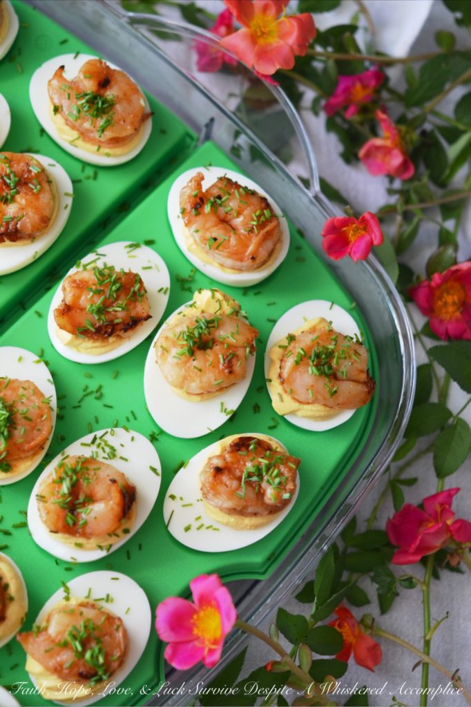 Honey-Barbecue Shrimp Deviled Eggs - Just when you think a deviled egg couldn't possibly get any more delicious, these Honey-Barbecue Shrimp Deviled Eggs come along. They're slightly sweet, tangy, and zesty, all while still remaining insanely creamy. Adding honey-barbecue basted shrimp to deviled eggs definitely makes them almost sinful.