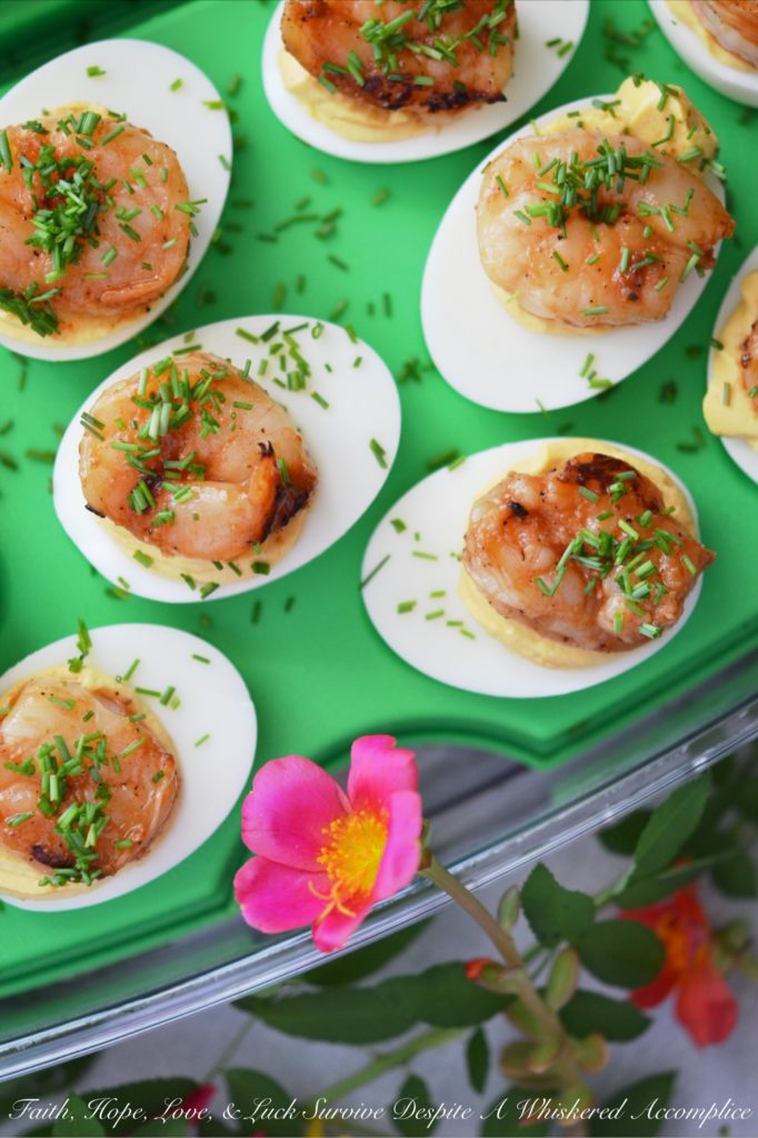 Honey-Barbecue Shrimp Deviled Eggs - Just when you think a deviled egg couldn't possibly get any more delicious, these Honey-Barbecue Shrimp Deviled Eggs come along. They're slightly sweet, tangy, and zesty, all while still remaining insanely creamy. Adding honey-barbecue basted shrimp to deviled eggs definitely makes them almost sinful.
