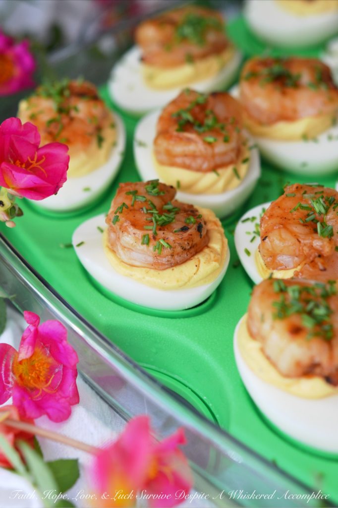 Honey-Barbecue Shrimp Deviled Eggs - Just when you think a deviled egg couldn't possibly get any more delicious, these Honey-Barbecue Shrimp Deviled Eggs come along. They're slightly sweet, tangy, and zesty, all while still remaining insanely creamy. Adding honey-barbecue basted shrimp to deviled eggs definitely makes them almost sinful.