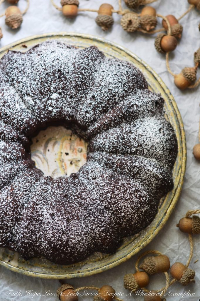 Flourless Chocolate Bundt Cake - This may just be "THE BEST CHOCOLATE CAKE" in the world; one that doesn't taste like cardboard, one that is super chocolatey, and one that contains absolutely no flour. This simple little flourless bundt cake will totally win your heart over with its lovely chocolate flavor.