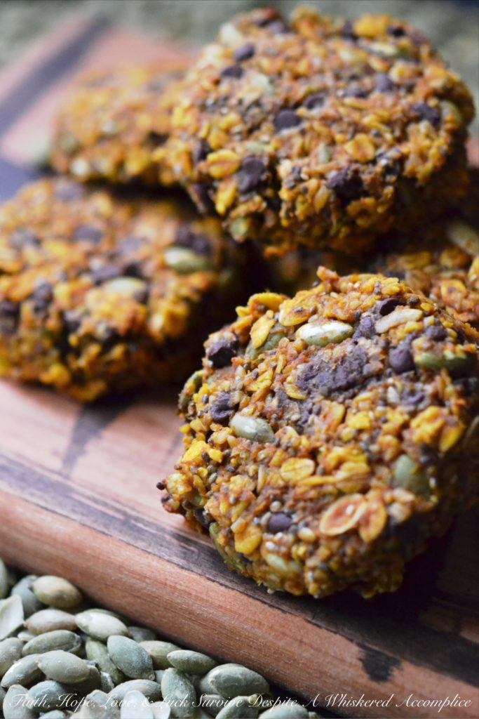 Pumpkin Chocolate Chip Granola Cookies - These pumpkin chocolate chip granola cookies are a delicious and healthy treat, packed with loads of flavor and texture. The oats, chia seeds, and pepitas provide a crunchy texture, while the pumpkin purée, peanut butter, honey, and cinnamon add just the right touch of sweet fall flavor. And once miniature chocolate chips are folded into the mix, these cookies will surely satisfy your sweet tooth, whether you enjoy them as a snack, an after-meal treat, or even as a breakfast companion to fresh fruit.
