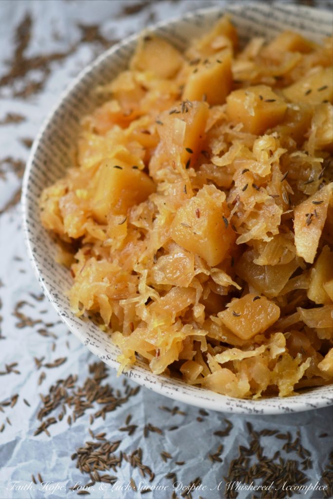 Autumn Crockpot Apple Sauerkraut - Give your crockpot sauerkraut the taste of autumn with the addition of seasonal apples, brown sugar, Oktoberfest beer, diced onion, and caraway seeds.