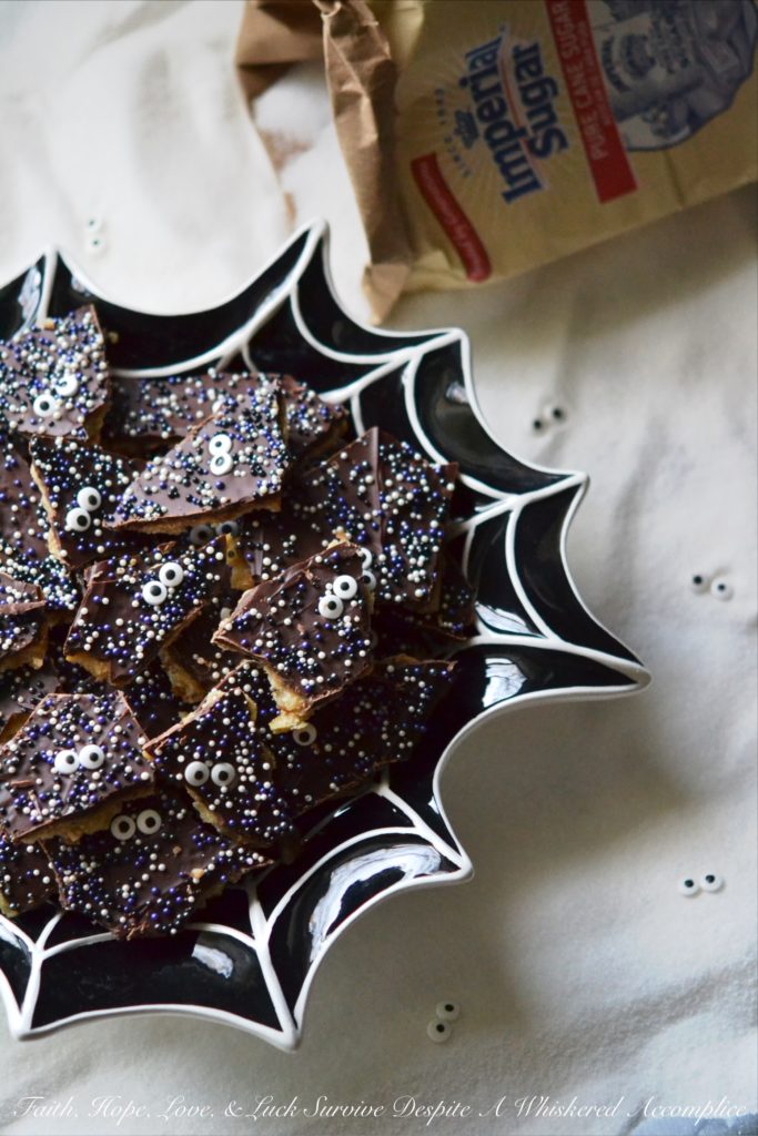 Spooktacular Halloween Cracker Candy - Be the house with the most trick-or-treaters next year...hand out this amazing homemade cracker candy and you'll have the ghost and goblins running to your house next year in anticipation.