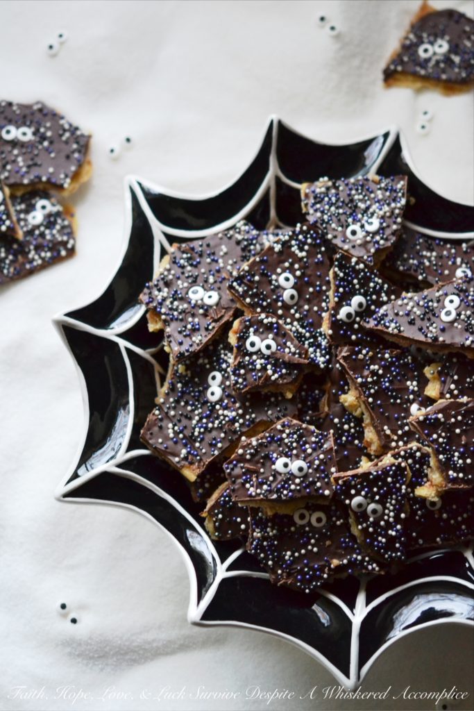 Spooktacular Halloween Cracker Candy - Be the house with the most trick-or-treaters next year...hand out this amazing homemade cracker candy and you'll have the ghost and goblins running to your house next year in anticipation.