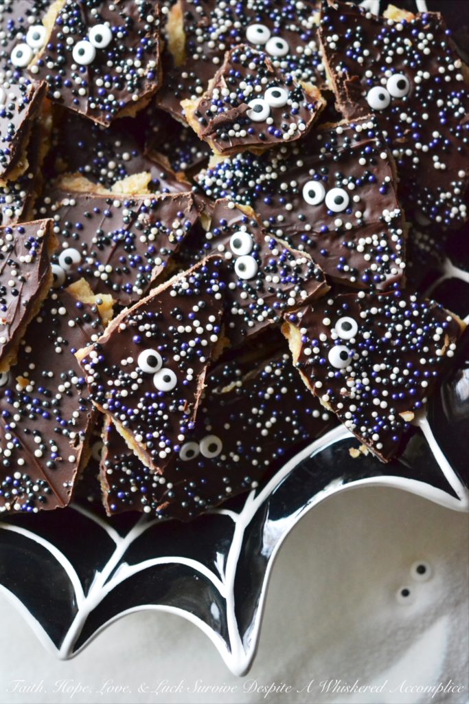 Spooktacular Halloween Cracker Candy - Be the house with the most trick-or-treaters next year...hand out this amazing homemade cracker candy and you'll have the ghost and goblins running to your house next year in anticipation.