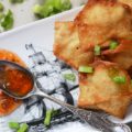 Southern Crab Rangoon - Southern Crab Rangoon truly is the perfect party appetizer, no matter what time of year it is. The secret to their great Southern flavor is a little bit of sweet and spicy pepper jelly added to their filing. And, after you dip these delicious little fried packages of cream cheese and crab meat into a sweet and flavorful boozy pepper jelly dipping sauce, you'll definitely become an instant fan.