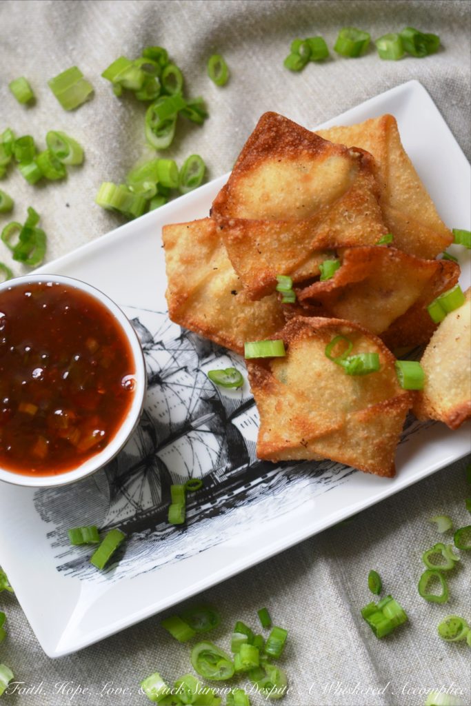 Southern Crab Rangoon - Southern Crab Rangoon truly is the perfect party appetizer, no matter what time of year it is. The secret to their great Southern flavor is a little bit of sweet and spicy pepper jelly added to their filing. And, after you dip these delicious little fried packages of cream cheese and crab meat into a sweet and flavorful boozy pepper jelly dipping sauce, you'll definitely become an instant fan.