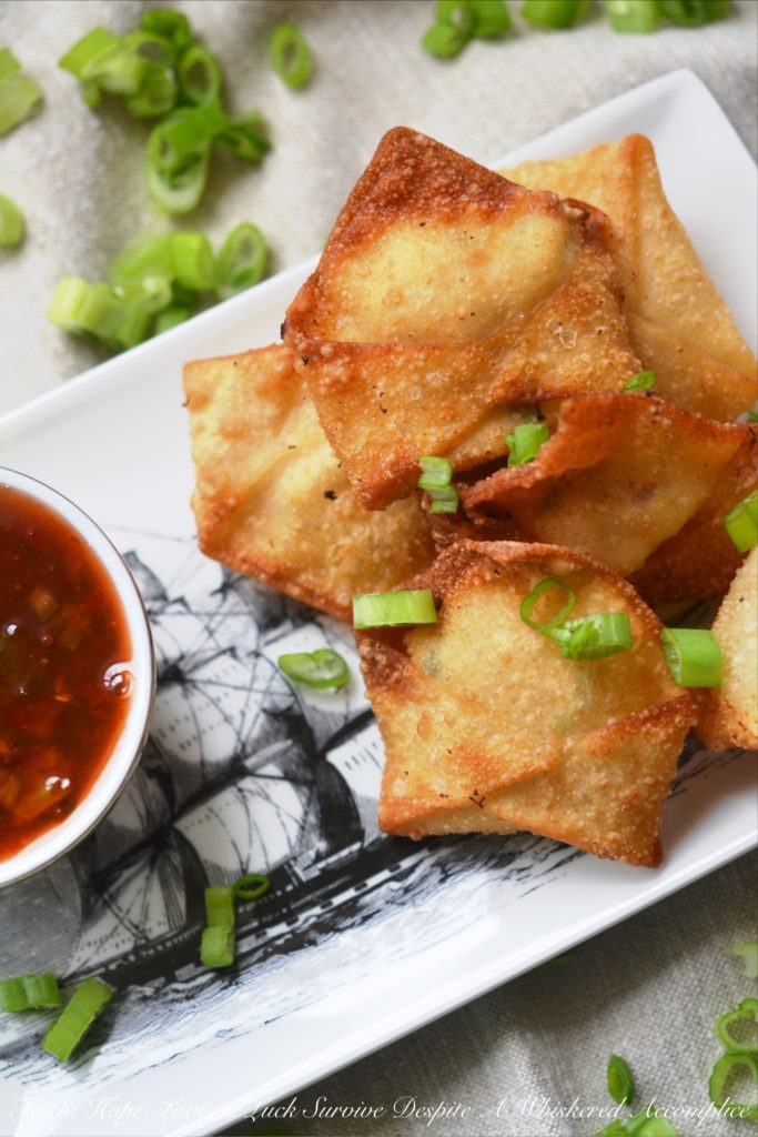 Southern Crab Rangoon - Southern Crab Rangoon truly is the perfect party appetizer, no matter what time of year it is. The secret to their great Southern flavor is a little bit of sweet and spicy pepper jelly added to their filing. And, after you dip these delicious little fried packages of cream cheese and crab meat into a sweet and flavorful boozy pepper jelly dipping sauce, you'll definitely become an instant fan.