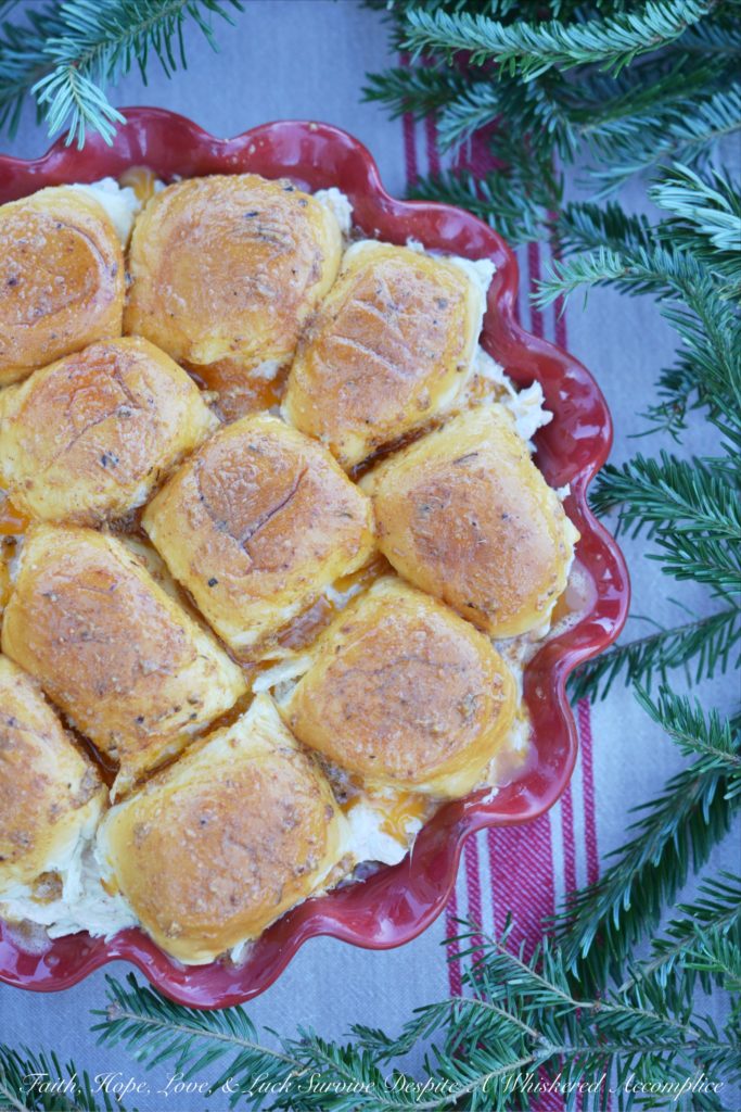Hawaiian Meets Cajun Crab Dip Sliders - Hawaiian Meets Cajun Crab Dip Sliders are the perfect winter appetizer to warm you up from the inside. They're cheesy, melty, crab-stuffed little sandwiches served up on pillowy soft sweet Hawaiian slider rolls, with just the right amount of Cajun kick to keep you coming back for more.